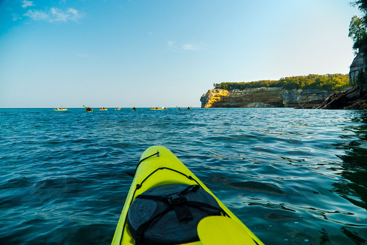 An intimate view of the Pictured Rocks cliffs on a Pictured Rocks Kayaking tour. PC: Pictured Rocks Kayaking