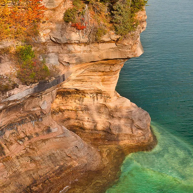 Flower Vase: Rock formation shaped like a vase, a delicate highlight of Pictured Rocks tours.