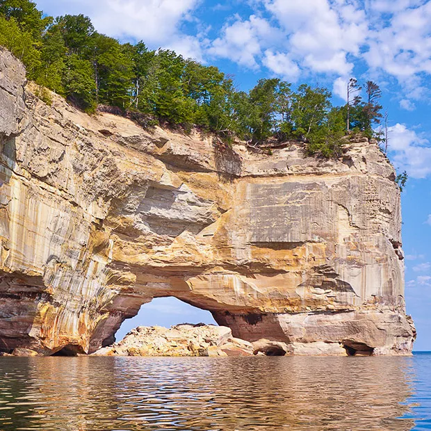 Grand Portal: Massive rock arch, a breathtaking highlight of Pictured Rocks boat tours.