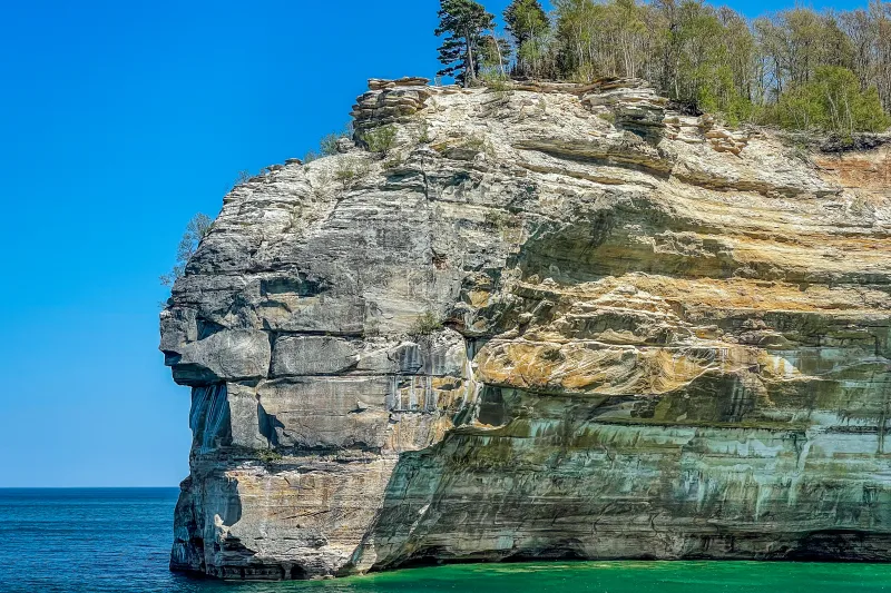 Indian Head, a large cliff face that is said to resemble a person's face in Pictured Rocks