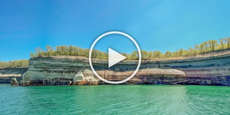 Mineral streaked cliffs of Pictured Rocks, as seen from a boat tour in late spring